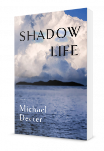 Book cover. Headline is "Shadow LIfe." Author is "Michael Decter." Image shows a cloudy sky over a body of water, with a line of land on the horizon.