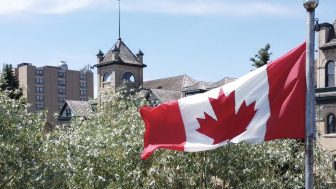The Canadian flag flies in front of the BU campus.