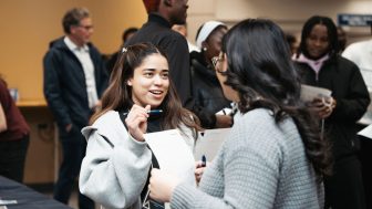 Co-op students mingle at an event earlier this year.